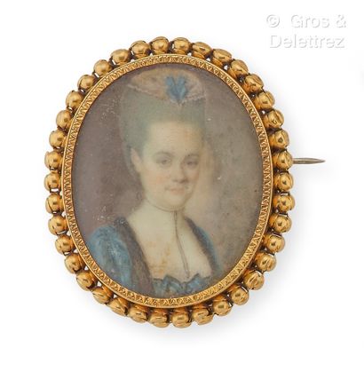 
Yellow gold brooch, decorated with a miniature...