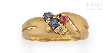 null Yellow gold ring, decorated with two sapphires, a diamond and ruby. Finger size...