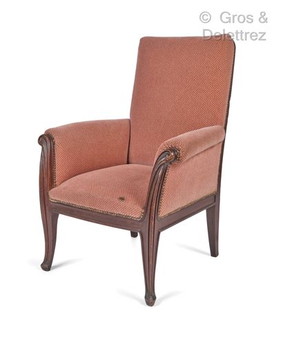 Louis MAJORELLE (1859-1926) Mahogany armchair with high back, carved molded front...