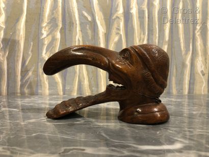 Casse-noix en bois naturel sculpté représentant...