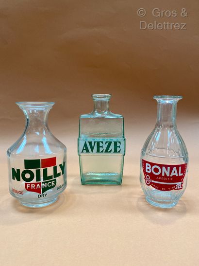 null Bonal - Noilly and Aveze. Three glass advertising decanters, one tinted gre...