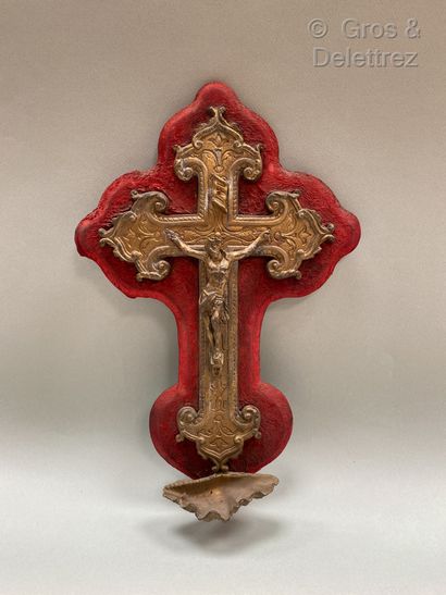 null Wall-mounted bronze stoup composed of a Chrit in the form of a cross, it is...