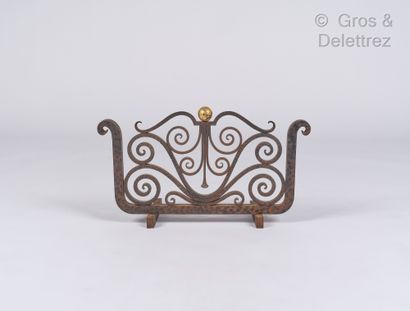 French work

Wrought iron fire screen decorated...