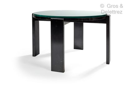 null JACQUES ADNET (1900-1984)

Coffee table in black lacquered wood with circular...