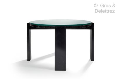 null JACQUES ADNET (1900-1984)

Coffee table in black lacquered wood with circular...