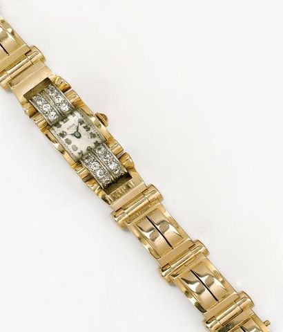 null Bracelet montre en or jaune, les attaches serties de diamants, mouvement mécanique,...