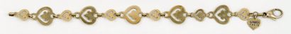 OJ PERRIN Bracelet articulé en or jaune à motifs «Coeur». Signé O.J Perrin. Poids...