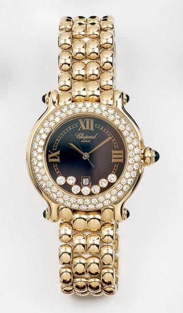 CHOPARD Bracelet montre de dame en or jaune, cadran noir orné de diamants mobiles,...