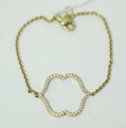 null Bracelet en or jaune et émail orné d'un motif serti de diamants. P. 3,9 g.