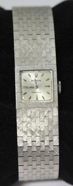 ROLEX Bracelet montre de dame en or gris, cadran argent, mouvement mécanique, bracelet...