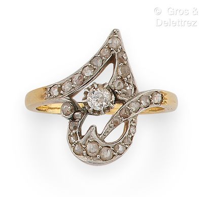 null Yellow gold and silver ring set with an old cut diamond in a circle of rose-cut...