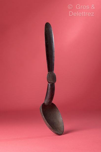 Object: Large carved spoon 
Ethnic group...
