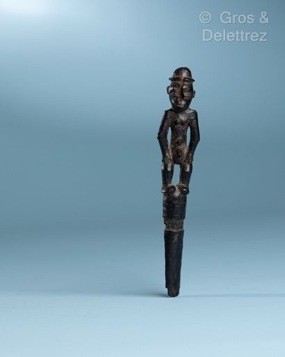 null Object : Top of cane carved with a man with a hat

Ethnicity: Tsogho

Material...