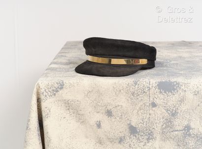 null Maison MICHEL - Cap in black lambskin, front decorated with a gold metal plate...