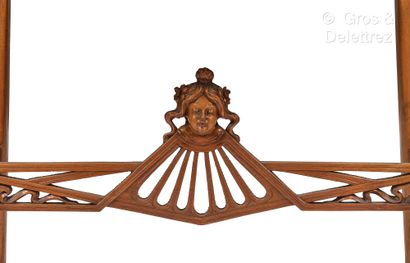 ERNESTO BASILE (1857-1932) Middle table in carved walnut decorated with interlacing,...