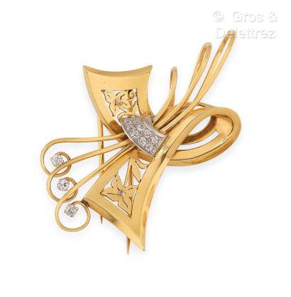 null Broche « Nœud » en or jaune, à décor de fils d’or et de rubans repercés de motifs...