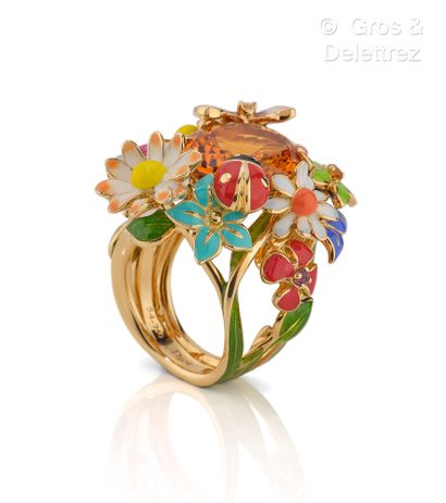 DIOR DIOR "Diorette" Yellow gold ring, set with an oval faceted citrine surrounded...