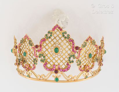 null Yellow gold tiara, composed of crosses and scrolls set with emeralds, rubies...