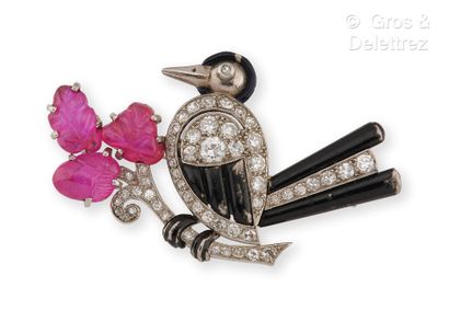 MAUBOUSSIN Platinum brooch, representing a bird on a branch. The body set with brilliant-cut...