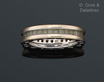 BULGARI Wedding ring in white gold, decorated with calibrated topazes. The edge engraved...