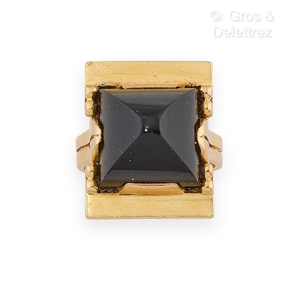 JEAN DESPRES, circa 1940 Yellow gold ring, consisting of a rectangular pattern holding...