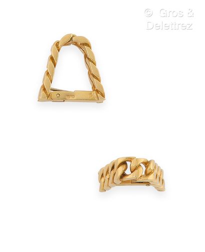 HERMES Pair of yellow gold cufflinks, composed of a curb chain. Signed Hermès and...
