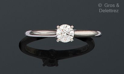 CARTIER Solitaire" ring in platinum, set with a brilliant-cut diamond. Weight of...