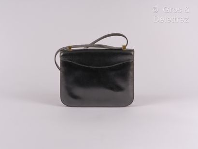 HERMES Paris Bag "Constance" 23 cm in black box, clasp "H" gold plated on flap, outside...