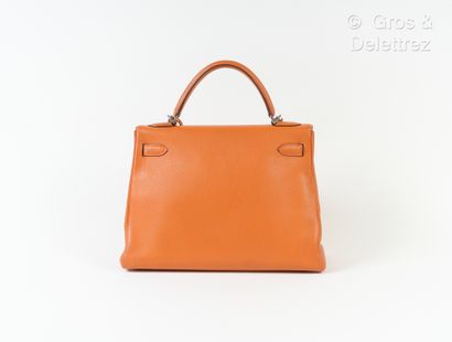 HERMES Paris made in France Year 2007 - "Kelly Retourné" bag 32 cm in orange Togo...