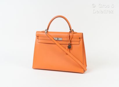HERMES Paris made in France Year 2007 - "Kelly Sellier" bag 36 cm in orange Epsom...