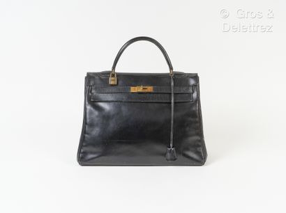 HERMES Paris Bag " Kelly Retourné" 35 cm in black box, gold plated fasteners and...