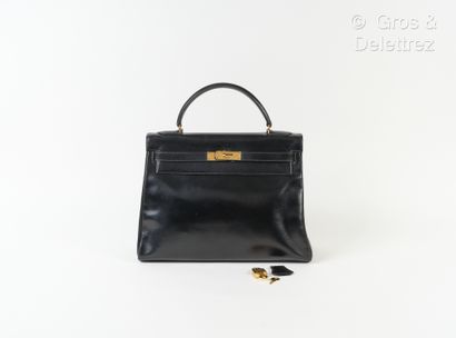 HERMES Paris made in France Year 1974 - "Kelly Retourné" bag 32 cm in black box,...