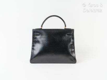 HERMES Paris made in France Year 1974 - "Kelly Retourné" bag 32 cm in black box,...