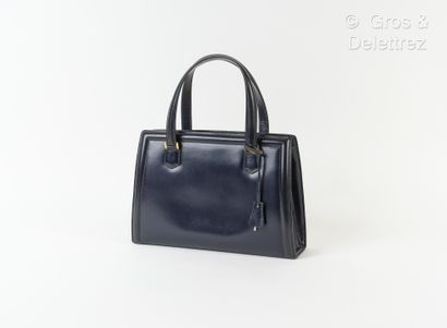 HERMÈS Paris Pullman" bag 30 cm in navy box leather, snap fastener on rigid frame,...