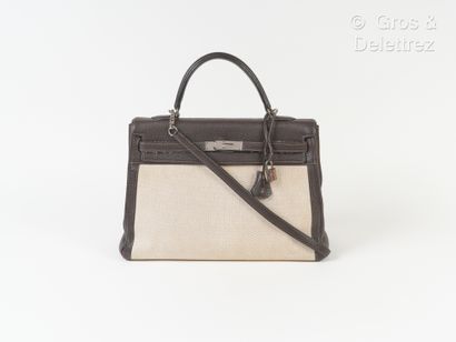 HERMES Paris made in France Year 2005 - Bag "Kelly Retourné" 35 cm in beige canvas...