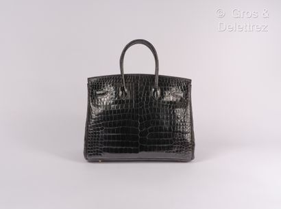 HERMES Paris made in France ∆ Year 2010 - "Birkin" bag 35 cm in black Crocodylus...