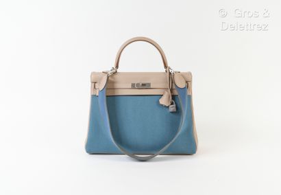HERMES Paris made in France Year 2014 - "Kelly Retourné" bag 35 cm in swift trench...