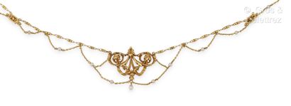 null Necklace "Drapery" in yellow gold, decorated with garlands and foliage holding...