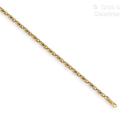 CHIMENTO Bracelet articulé en or jaune. Signé Chimento. Longueur : 20 cm. P. Brut...