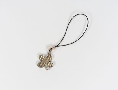 CHANEL Jewel of telephone " Clover " in silver plated metal.