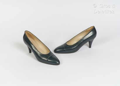CHANEL Pair of navy lambskin leather pumps, covered heels 70 mm, leather soles. T.37...