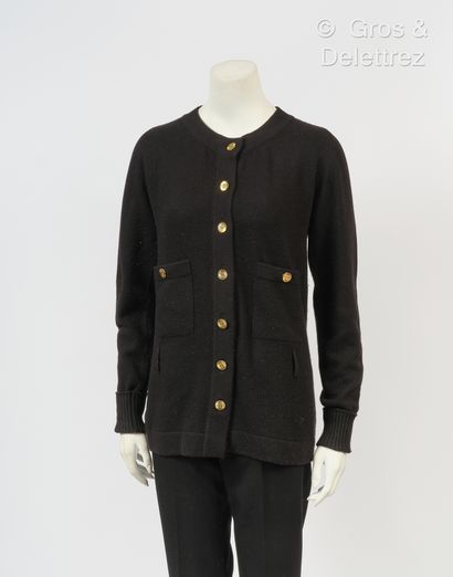 CHANEL Black cashmere cardigan, round neckline, single breasted, long sleeves, two...