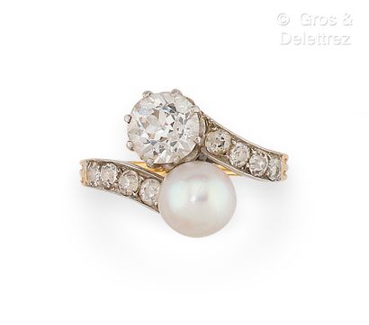 null Yellow gold and platinum "You and Me" ring, set with a cultured pearl and an...