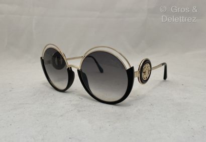 null ROBERTO CAVALLI Pair of round sunglasses in black resin and gold metal, temples...