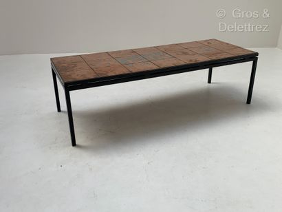 null 
Travail 1960






Table basse, plateau rectangulaire en métal cuivré à décor...