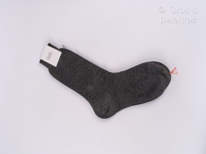 null HERMES Paris - Lot composed of a pair of socks embroidered in anthracite wool...