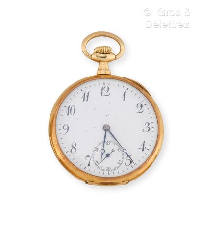 null Yellow gold tuxedo watch, round case, white enamel dial with painted Arabic...