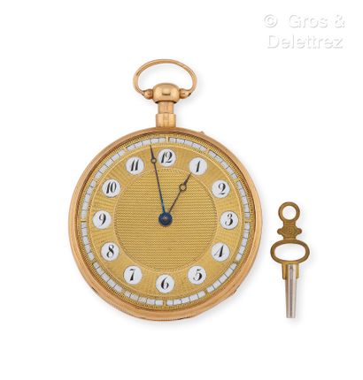 null Yellow gold cockerel watch with striking, radiating gold dial with black enameled...