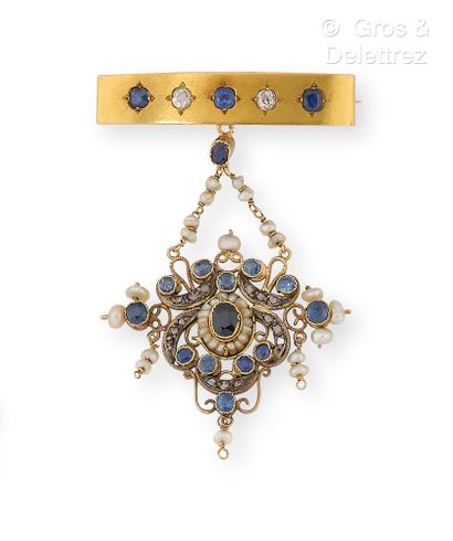 null Brooch "Barrette" in yellow gold, set with sapphires and old cut diamonds. It...