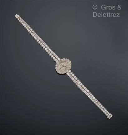 ALEX HÜNING Genève, vers 1960 Montre de poignet de dame en or gris 750 millièmes...